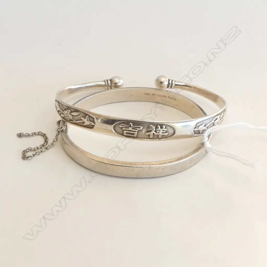 2 SILVER BANGLES: 1 HINGED the other Chinese with symbols of cuff form Image 1++
