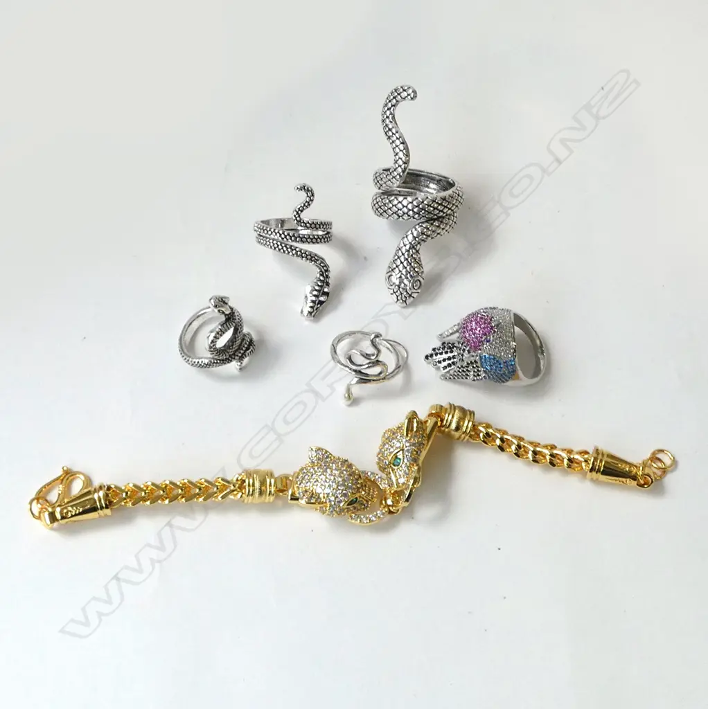 COSTUME ITEMS; DIAMANTE BRACELET, 4 SNAKE RINGS & BIRD RING Image 1++
