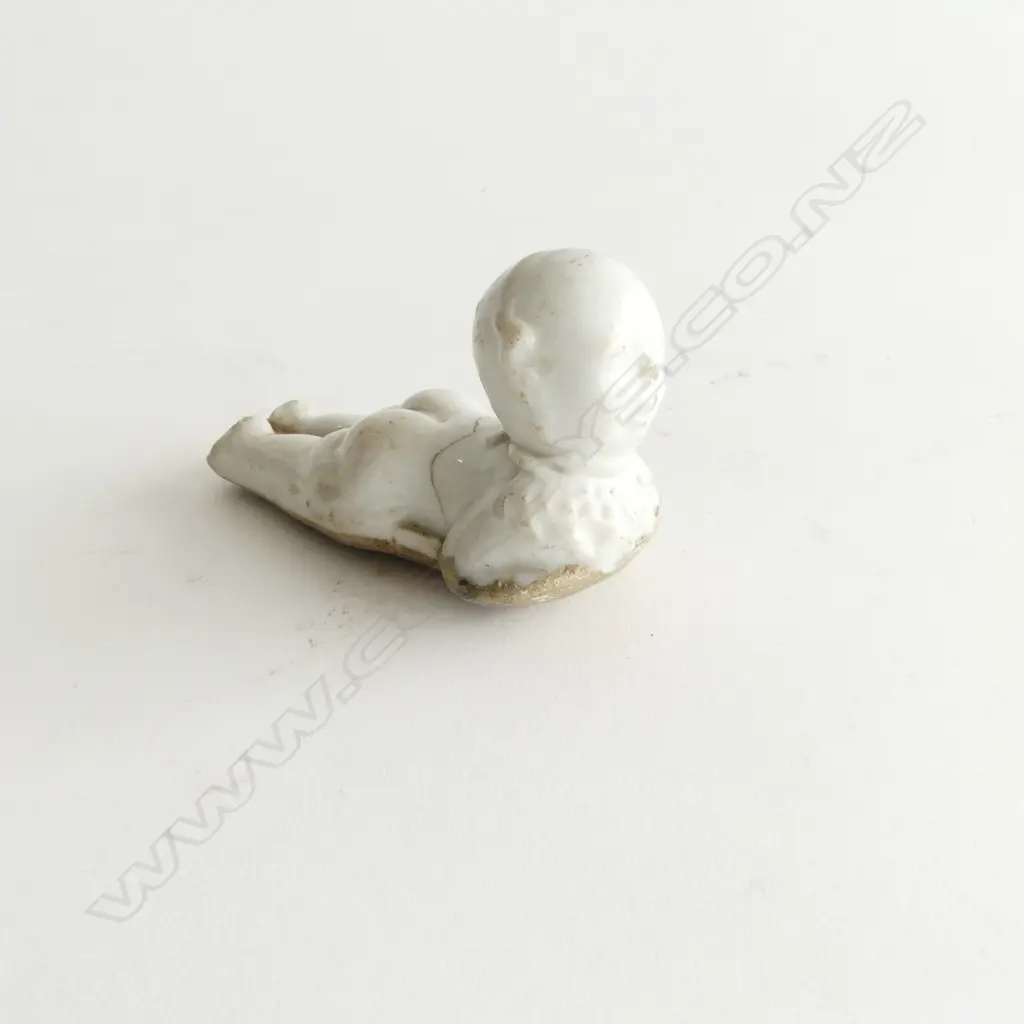 OLD PORCELAIN BABY DOLL faulted L.80mm. Vendor's Provenance: Found on the gold fields  Image 1++