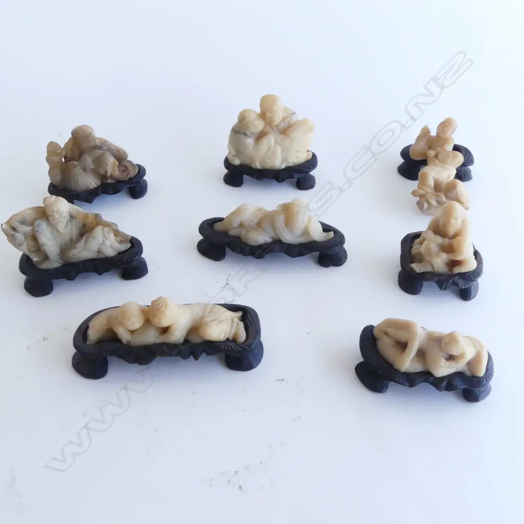 8 small ORIENTAL CARVED STONE FIGURES in fitted wooden carved bases. Image 1++