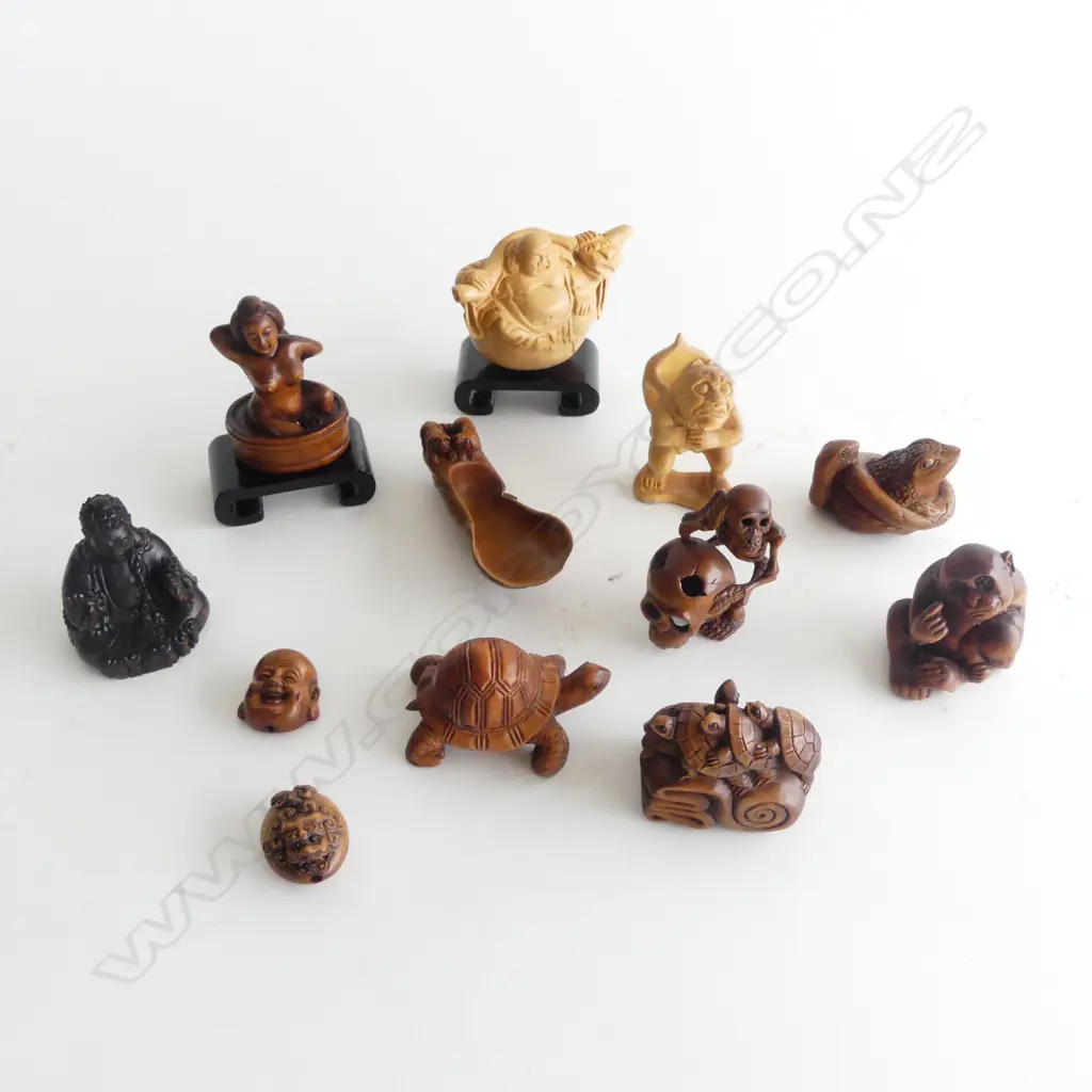 COLLECTION OF 12 CARVED WOOD NETSUKE Image 1++