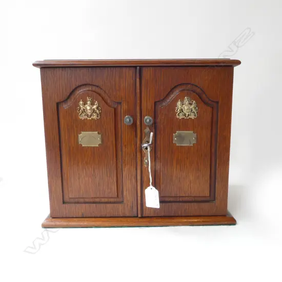 OAK SMOKERS CABINET; UK COAT OF ARMS TO DOORS, 330x220x285mm
