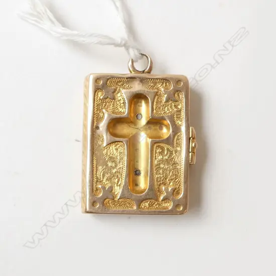 14ct GOLD BIBLE LOCKET 11.4grms some wear. 4 oval glazed interior sections