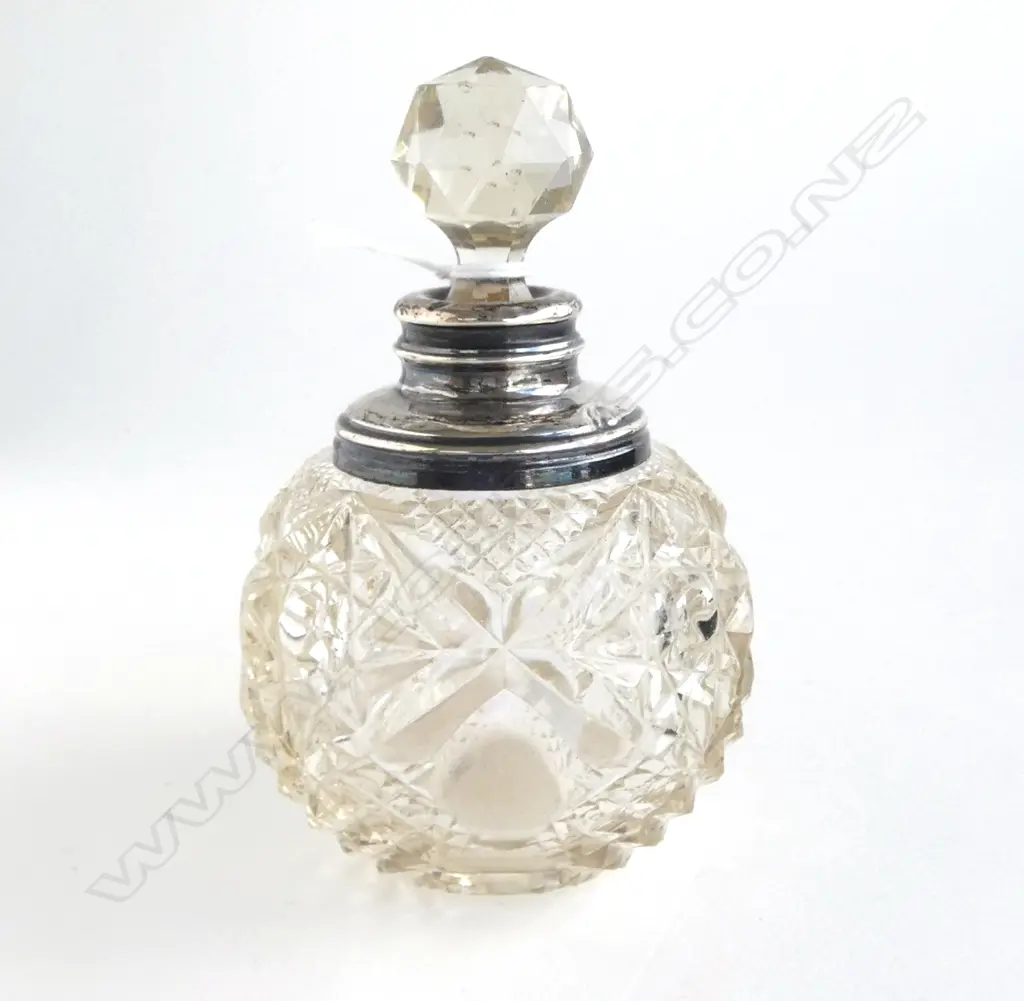 EDWARDIAN FANCY SILVER TOPPED CUT CRYSTAL PERFUME BOTTLE. H.115mm Image 1++