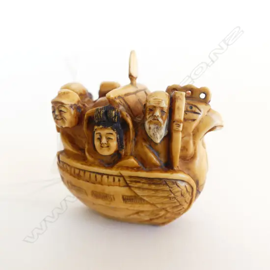 SIGNED IVORY NETSUKE  BOAT PEOPLE 