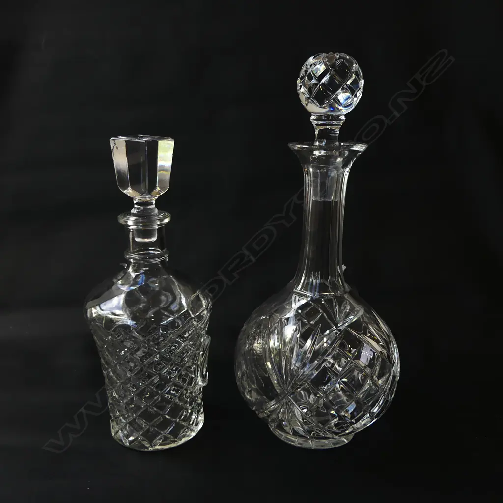 2 DECANTERS - 1 GLASS WITH DAMAGED STOPPER & 1 CRYSTAL H.300mm Image 1++