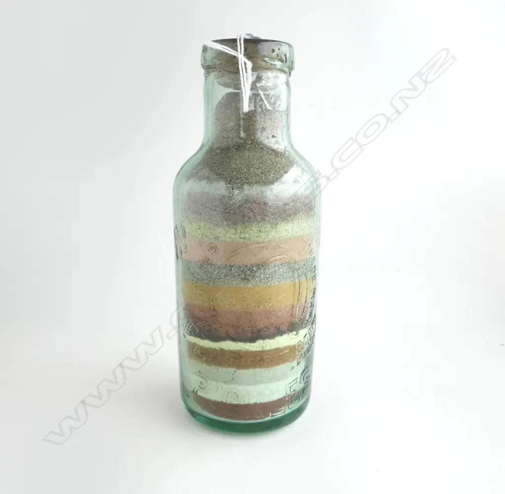 ROTORUA COLOURED SANDS IN HAYWARD BROS. PICKLE BOTTLE H.200mm Image 1++