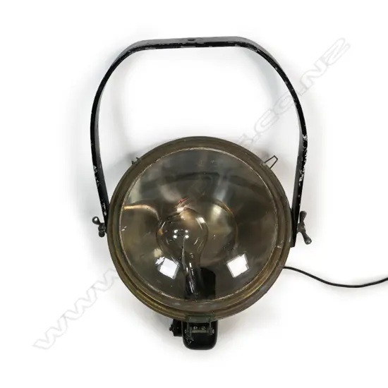 A vintage General Electric ship's search or spot light,