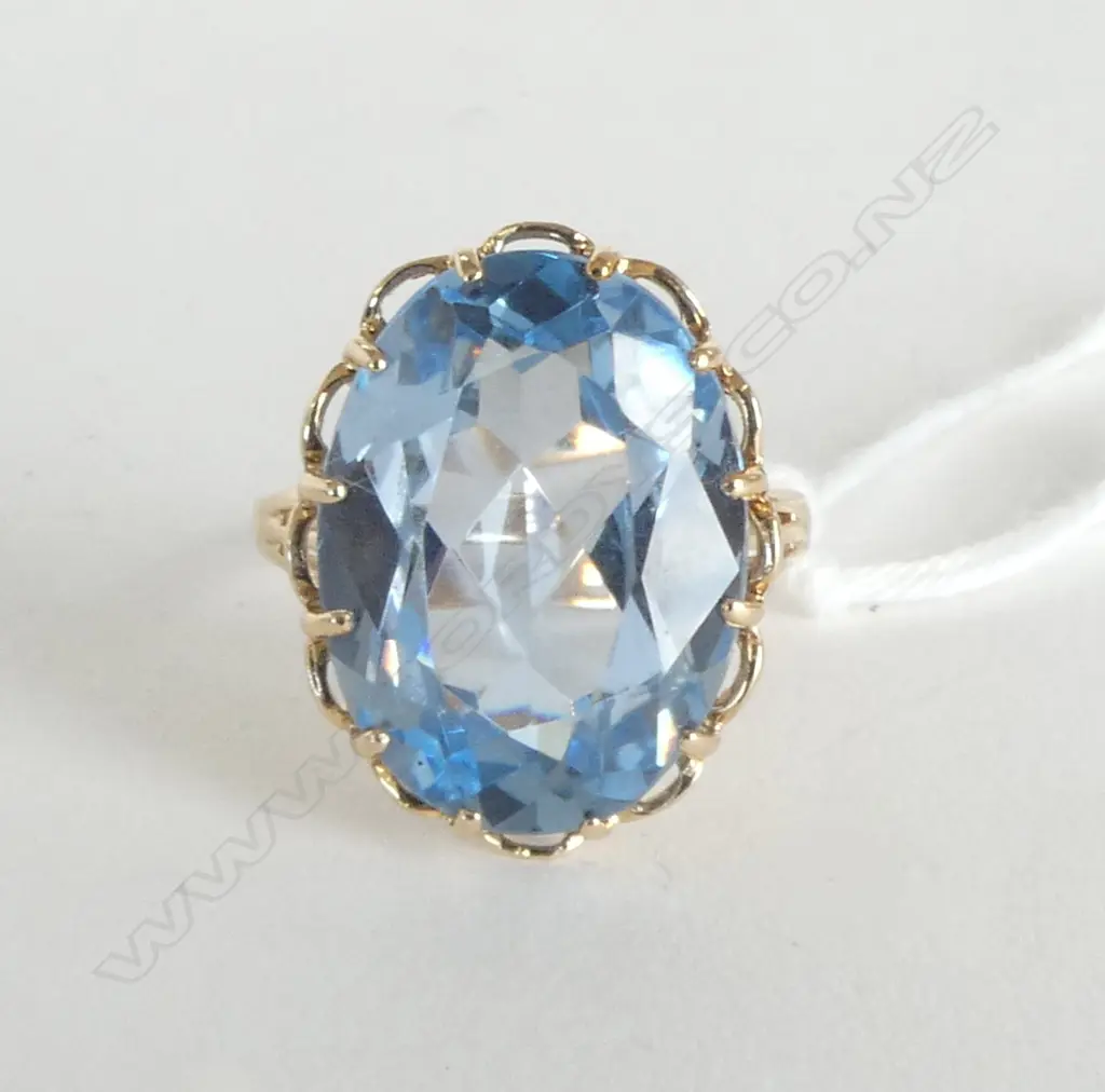 **RTV**  10ct BLUE GEM SET RING, 6gm SIZE O (possible synthetic blue aquamarine) Image 1++
