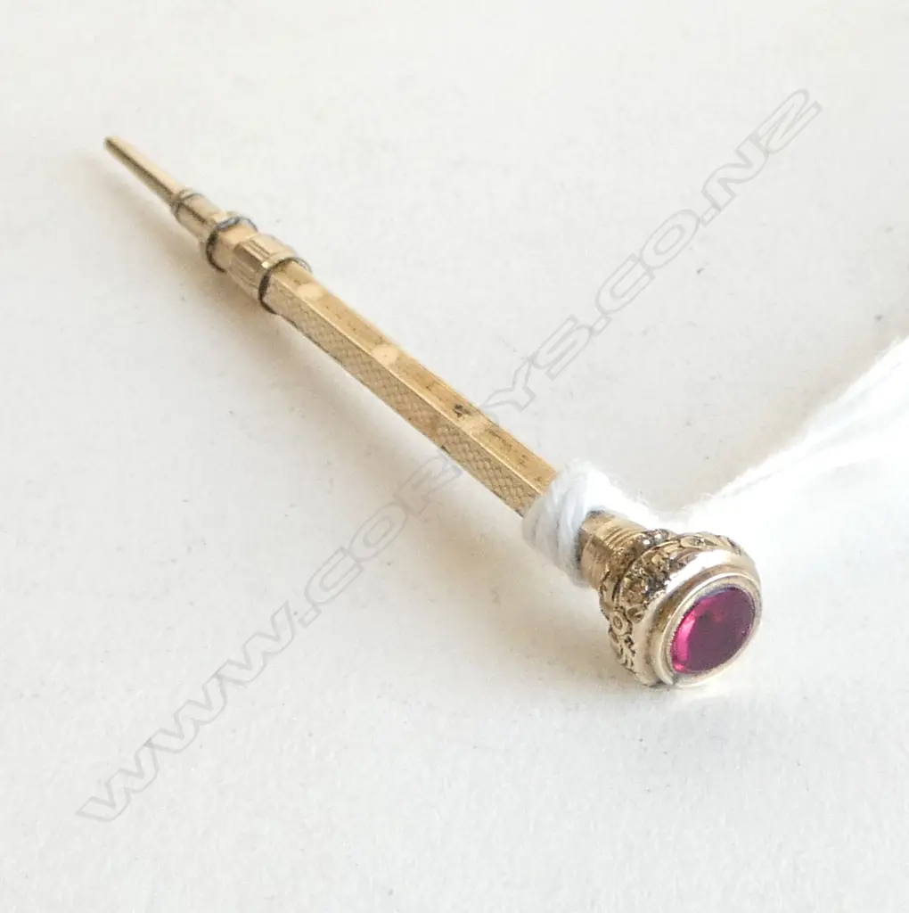 9CT GOLD PROPELLING PENCIL WITH RED STONE TOTAL WIEGHT 3.7GMS Image 1++