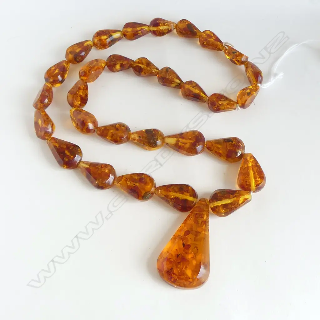 PROCESSED AMBER NECKLACE graduated with lge pendant SUN SPANGLE INCLUSIONS. L.660mm Image 1++