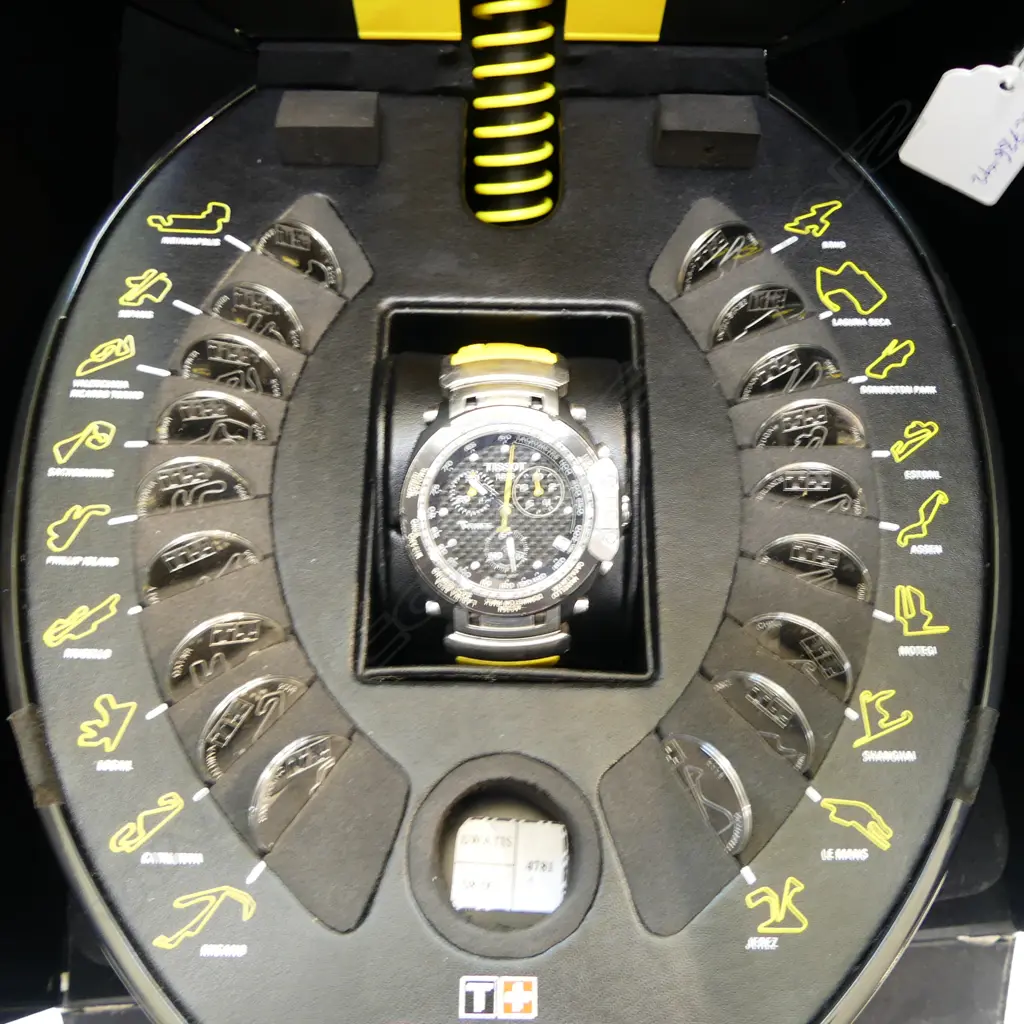 TISSOT MOTOGP 2008 T RACE VALENTINO ROSSI LTD. ED. GENTS WRISTWATCH; In helmet case, orig. box, 18 race medallions Image 1++