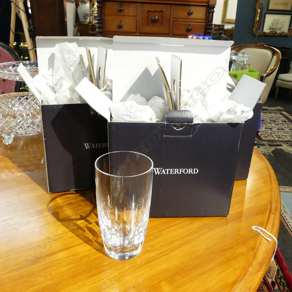 A set of eight Waterford crystal highball drinking glasses notch detail. H.135mm. Original boxes as new. Retail $687. Image 1++