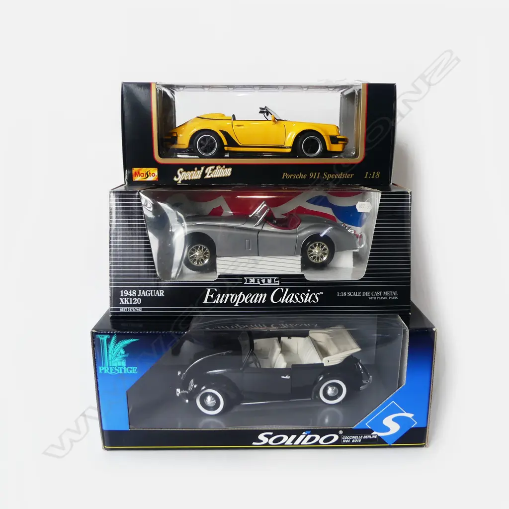 3 BOXED 1:18 MODEL CARS; PORSCHE 911, 1948 JAGUAR, SOLIDO Image 1++