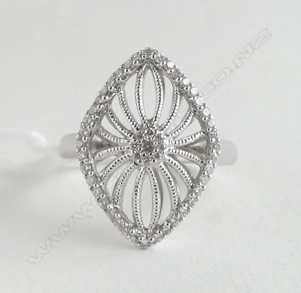 18ct WHITE GOLD & 49 DIAMOND RING TDW. 0.30ct radiating lozenge design SIZE N Image 1++
