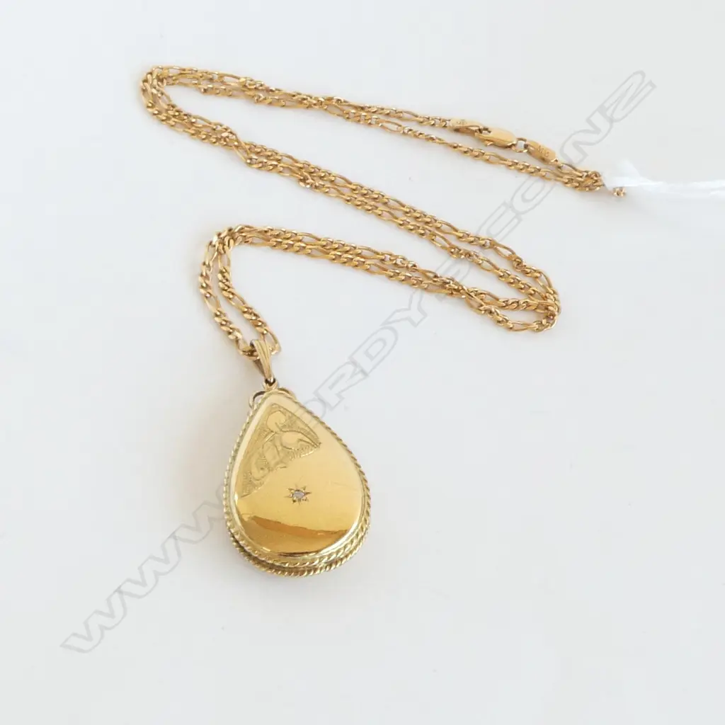 9CT GOLD LOCKET AND CHAIN  12.39gms Image 1++