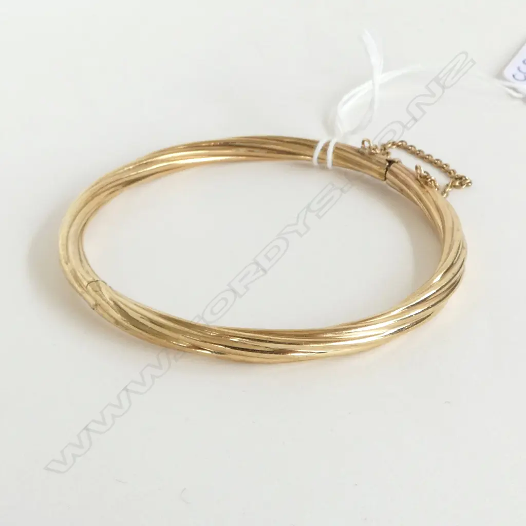 9CT GOLD TWIST HINGED BANGLE 14.7gms Image 1++