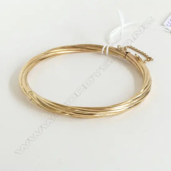 9CT GOLD TWIST HINGED BANGLE 14.7gms