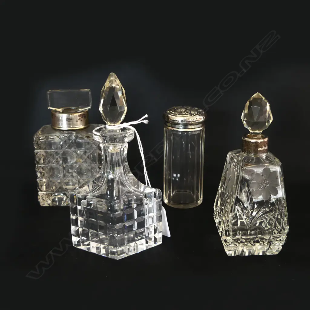 4 CRYSTAL BOTTLES; 3 w. STG TRIM H.125mm 1 crystal top chipped to base Image 1++
