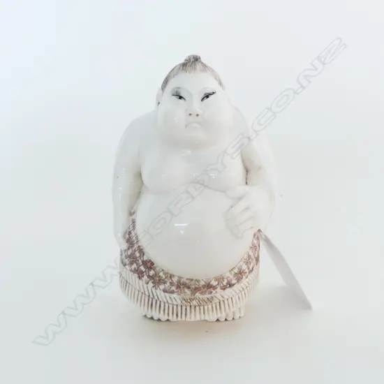 ORIENTAL CARVED IVORY FIGURE OF A SUMO WRESTLER stained highlights H.98mm