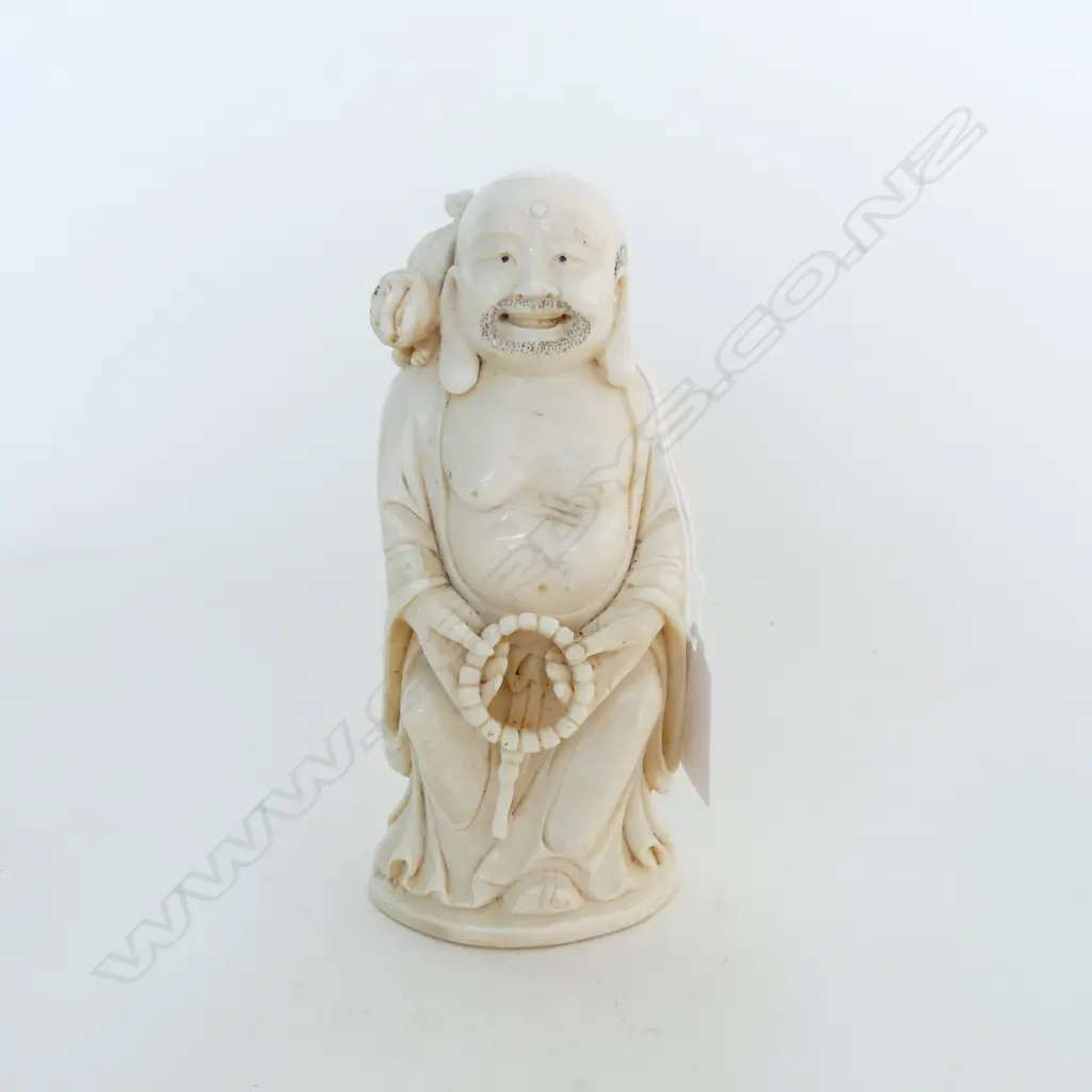 ORIENTAL CARVED IVORY LARGE FIGURE OF A DEITY with shishi to his shoulder H.150mm. 420gms. Image 1++