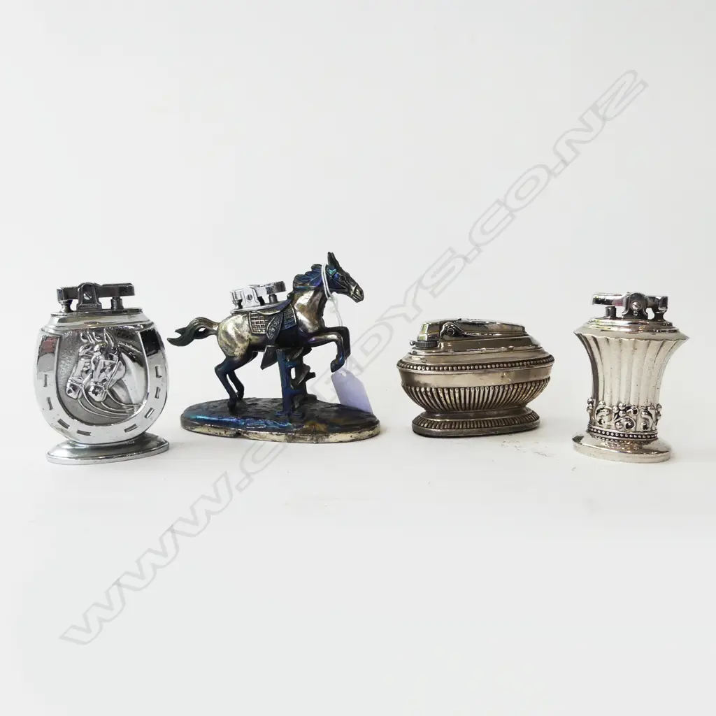 FOUR TABLE LIGHTERS; 2 w. HORSE MOTIFS, LARGEST H.100mm Image 1++