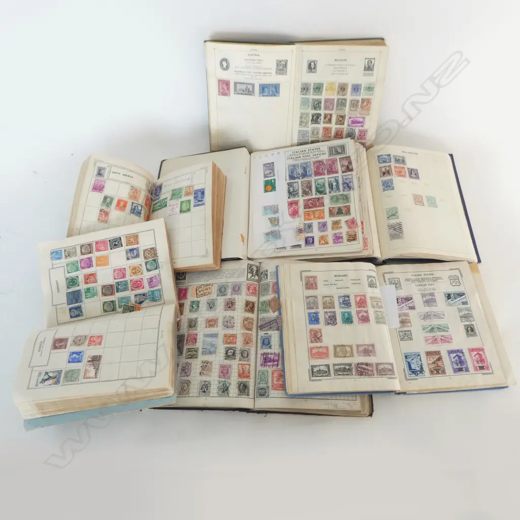 7 VINTAGE STAMP ALBUMS Image 1++