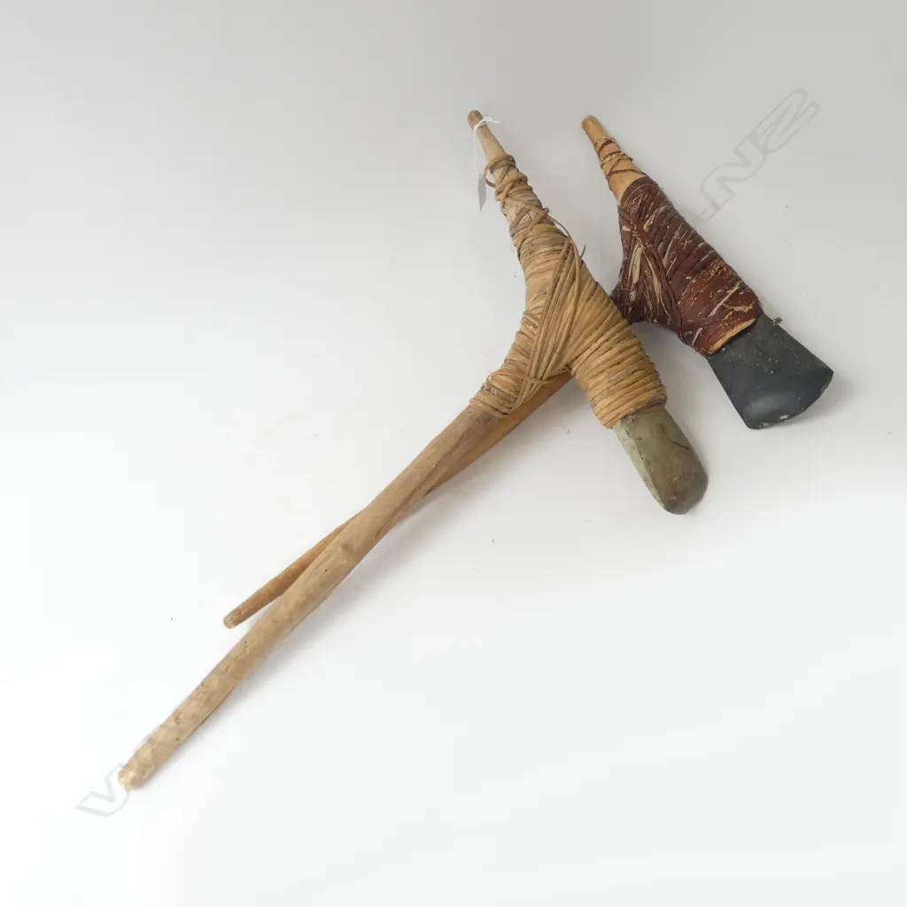 2 WOODEN PACIFIC ISLAND HANDLED STONE ADZES LASHED w SENNIT BINDING, L.560 x 390mm (a few borer holes in handles) Image 1++