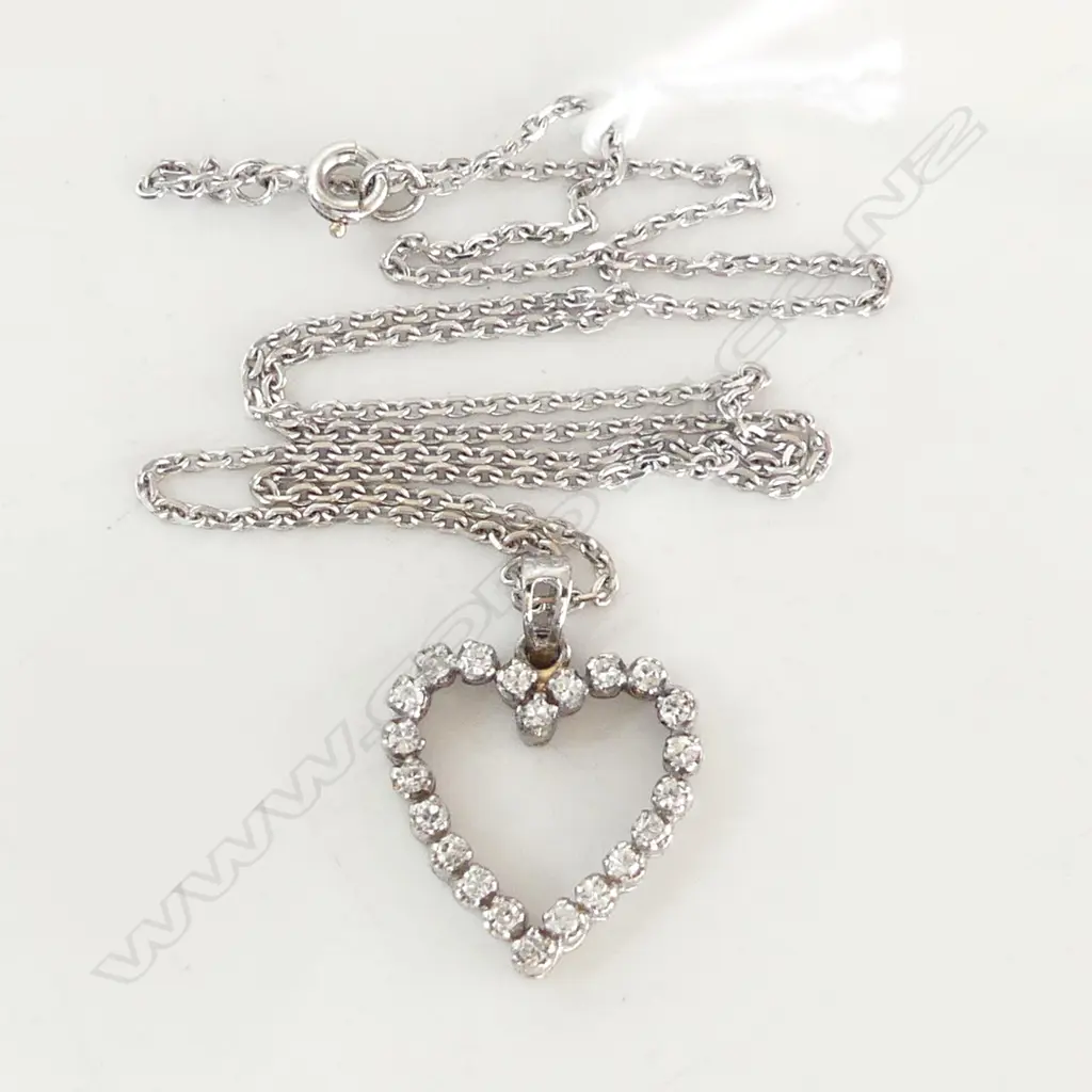 18ct DIAMOND SET HEART form PENDANT ON 18CT CHAIN 5.22gms. Ins. $3500 Image 1++