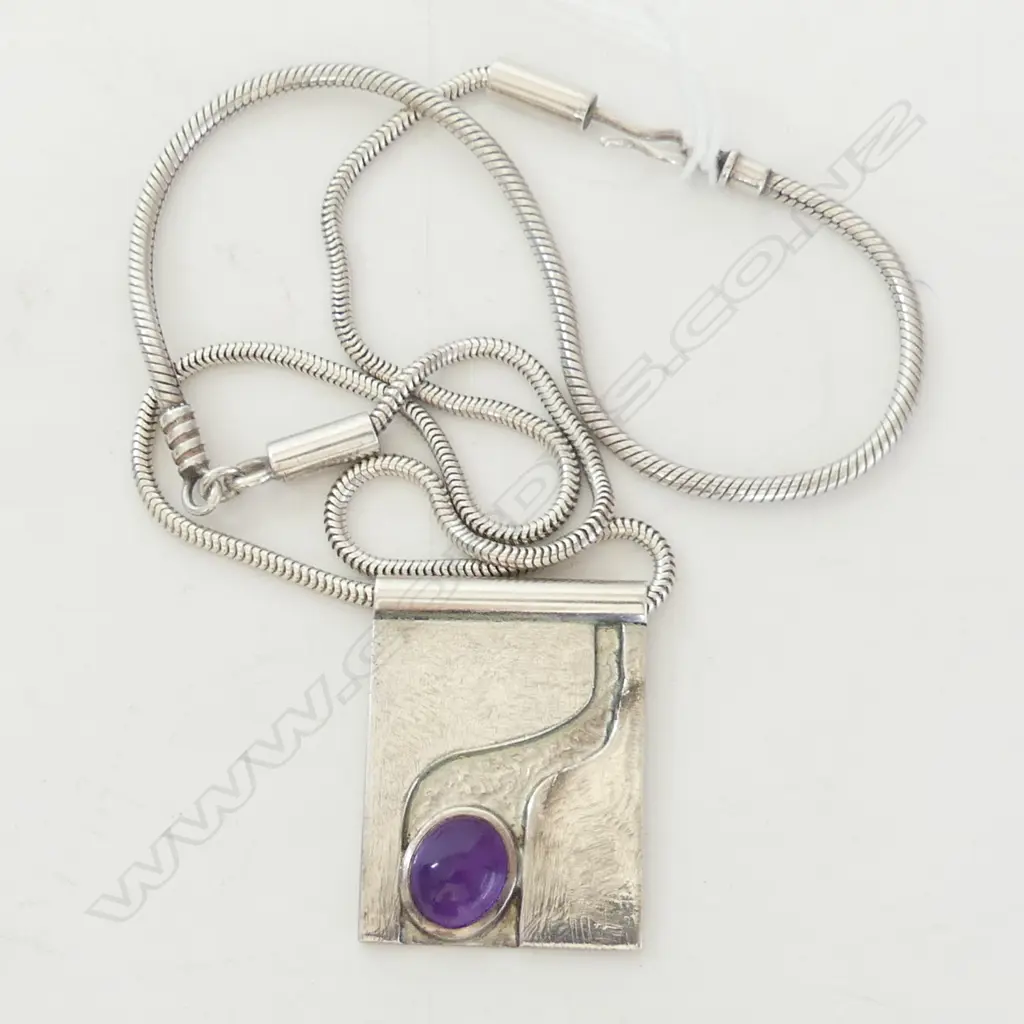 SILVER MODERNIST PENDANT w CABOCHON AMETHYST, by JENS HANSEN for exhibition at Watson's Jewellers ChCh. c.1980s. Image 1++