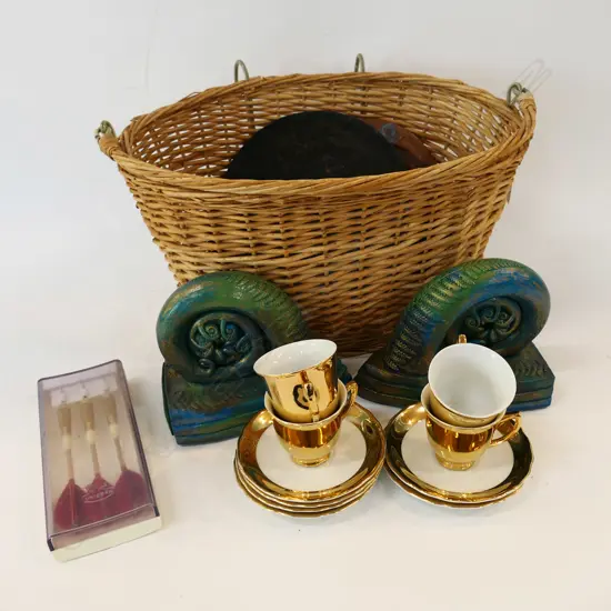 BASKET + ASST. CONTENTS; GOLD CUPS, KORU BOOKENDS ETC