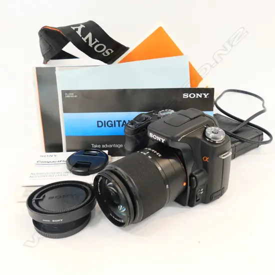 SONY DSLR-A100 DIGITAL CAMERA + LENS & ASST. CABLES