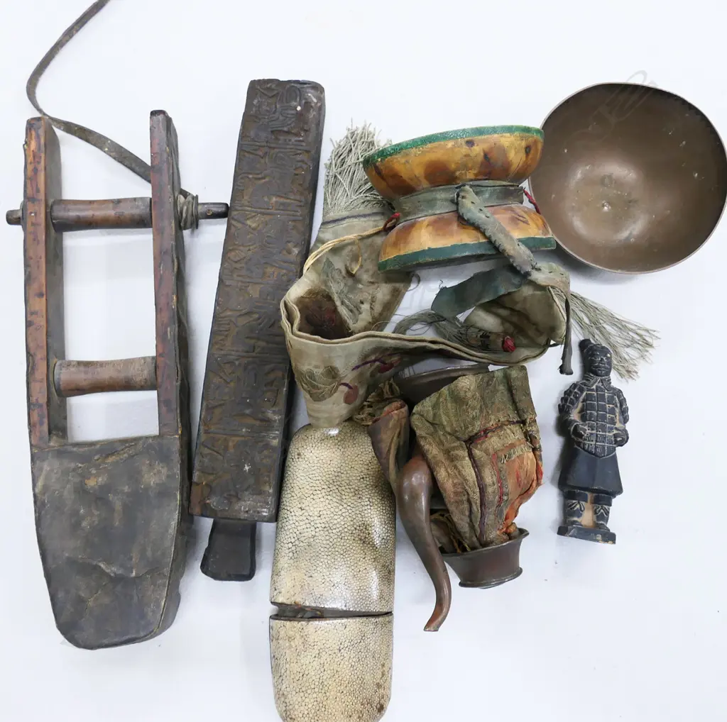 ASST. TRIBAL PCES; 2 WOODEN TOOLS L.315mm, DRUM, SHAGREEN CASE, METAL TEAPOT & BOWL, BURIED SOLDIER H.120mm Image 1++