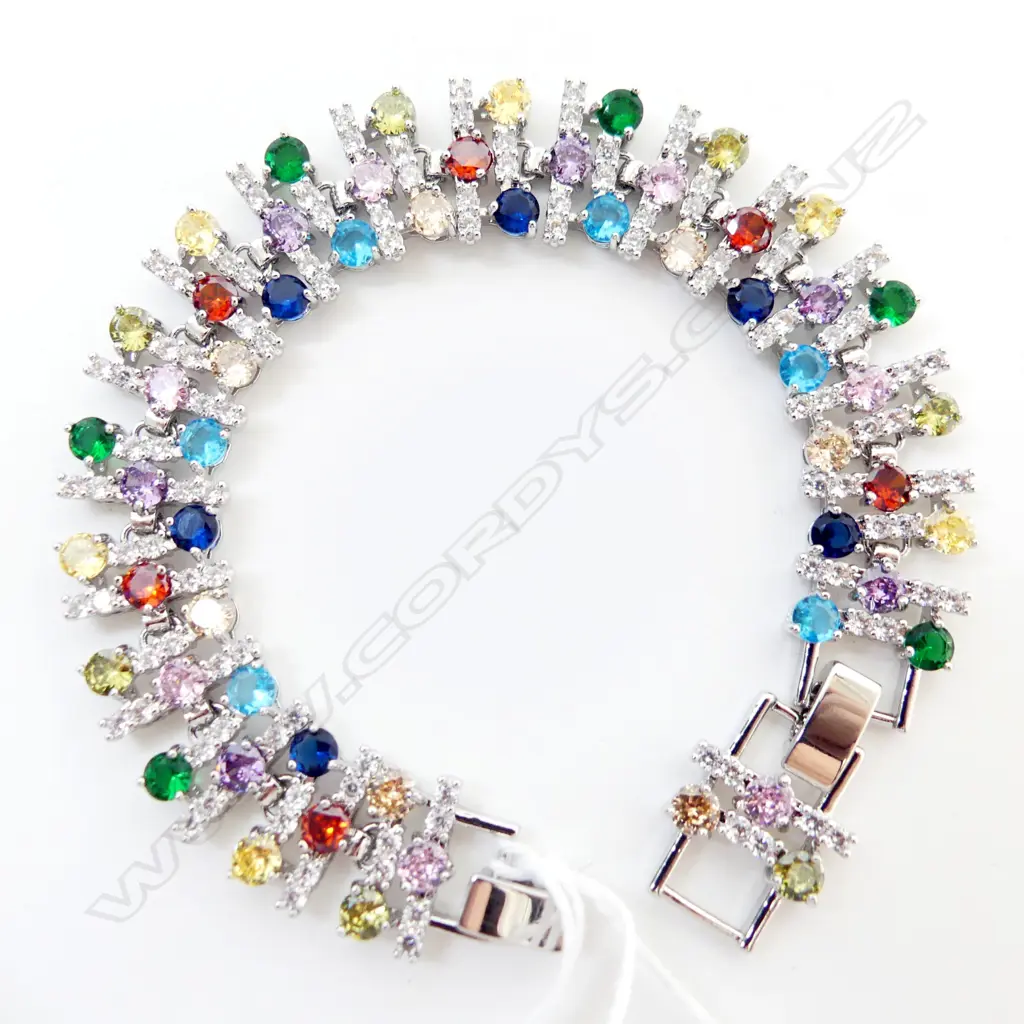IMPRESSIVE COSTUME BRACELET, MULTI COLOURED STONES w WHITE GOLD LOOK FINISH Image 1++