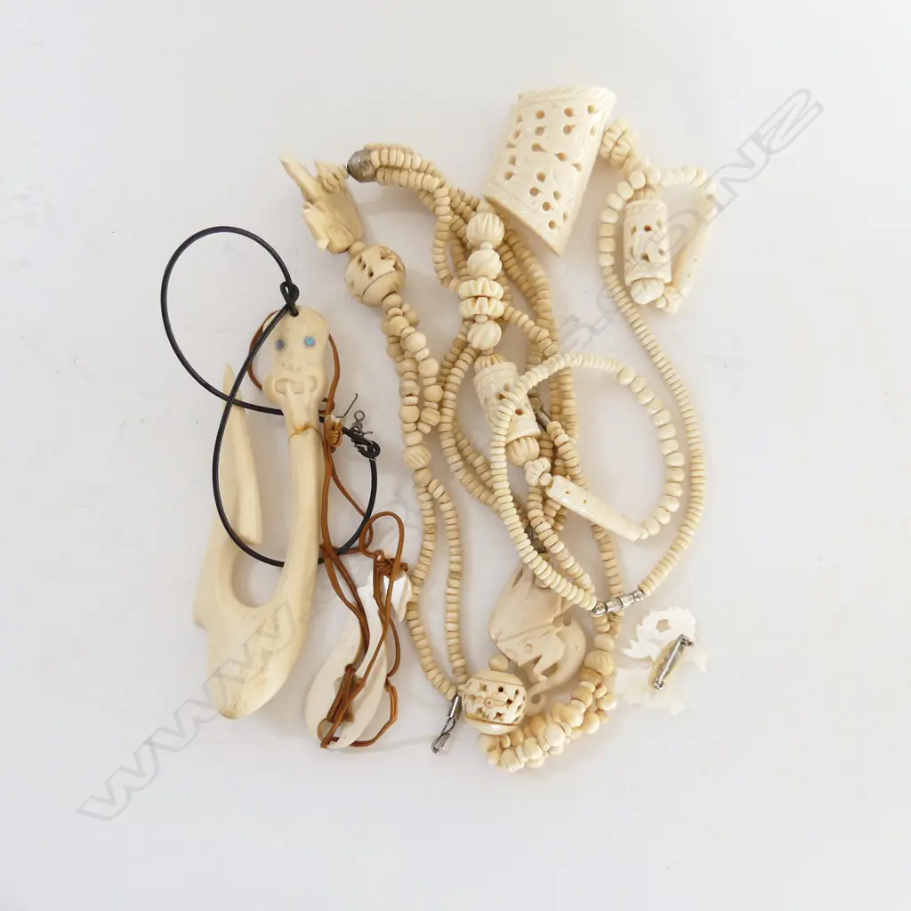 BOX OF ASST BONE CARVINGS; ASIAN & MAORI Image 1++