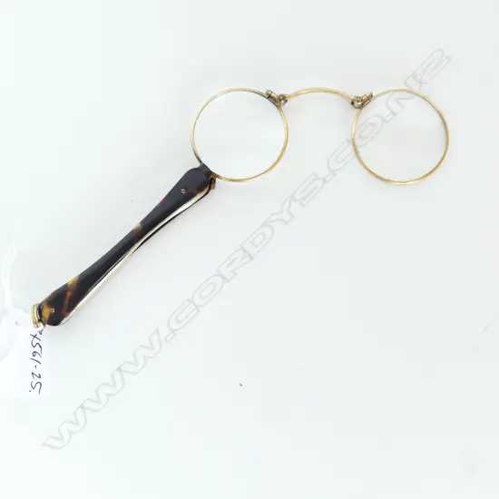 A pair of gold plated tortoiseshell handled lorgnettes