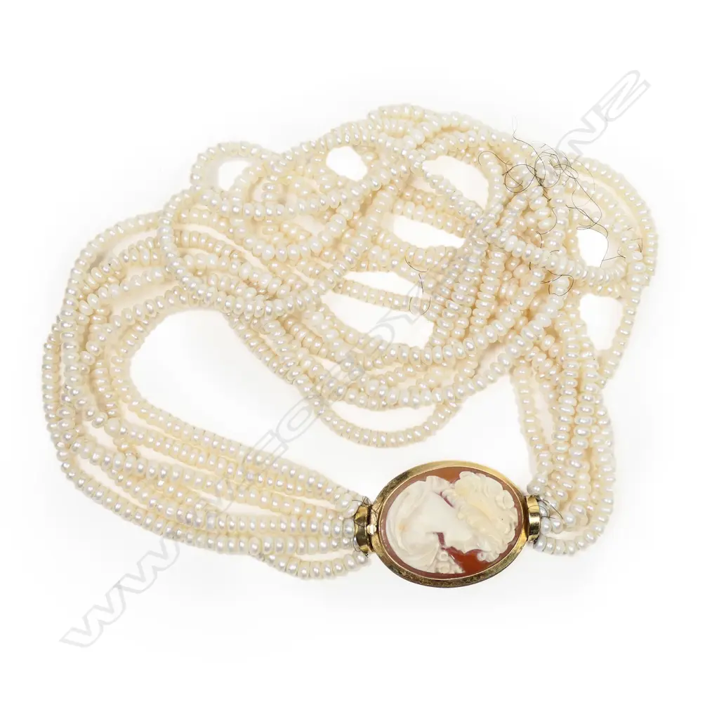 A heavy18ct yellow gold and cameo clasped six strand pearl necklace, Image 1++