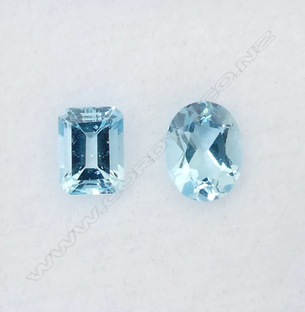 BLUE TOPAZ OVAL & OCT. CUT 2 = 4.13CT Image 1++