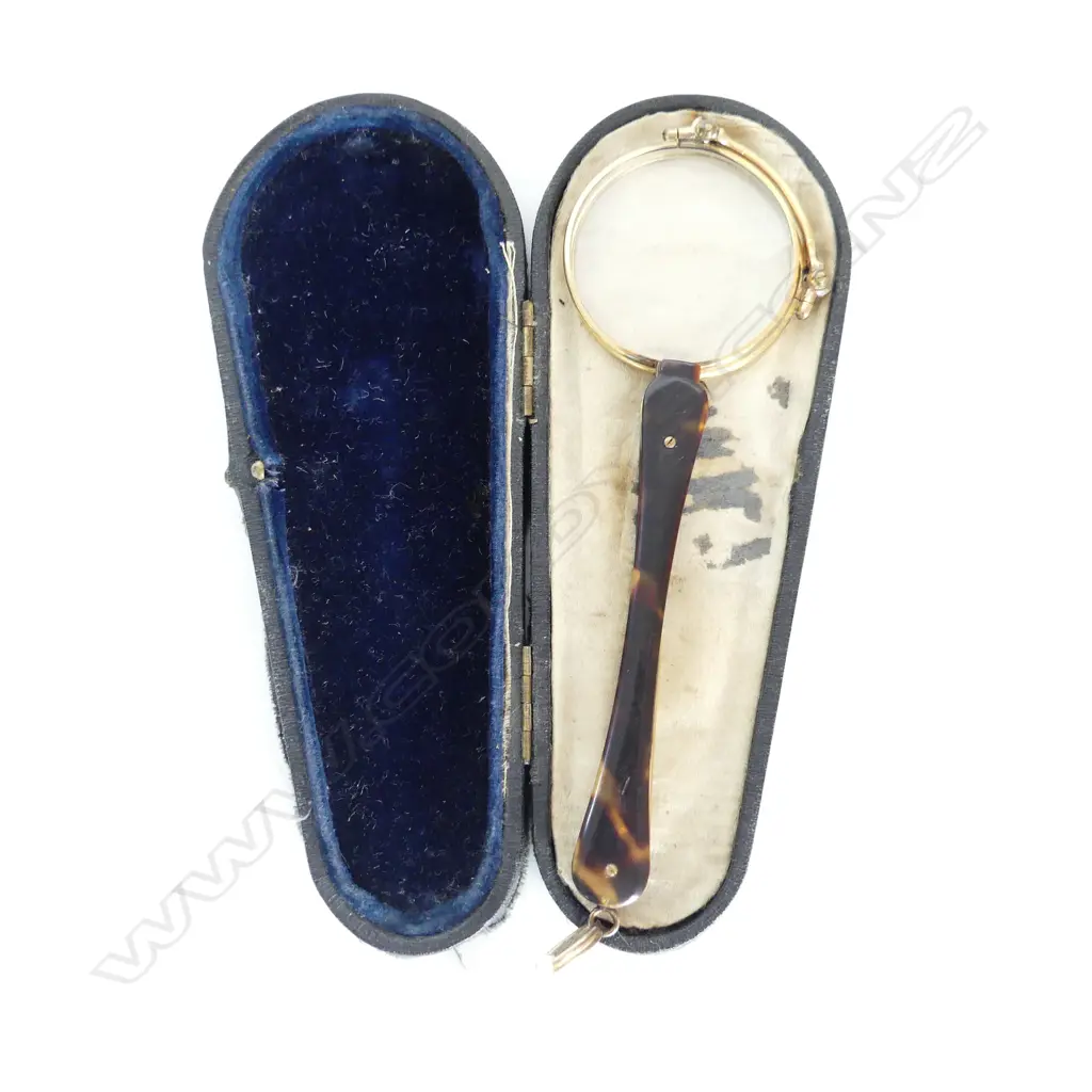 A pair of gold plated tortoiseshell handled lorgnettes Image 1++