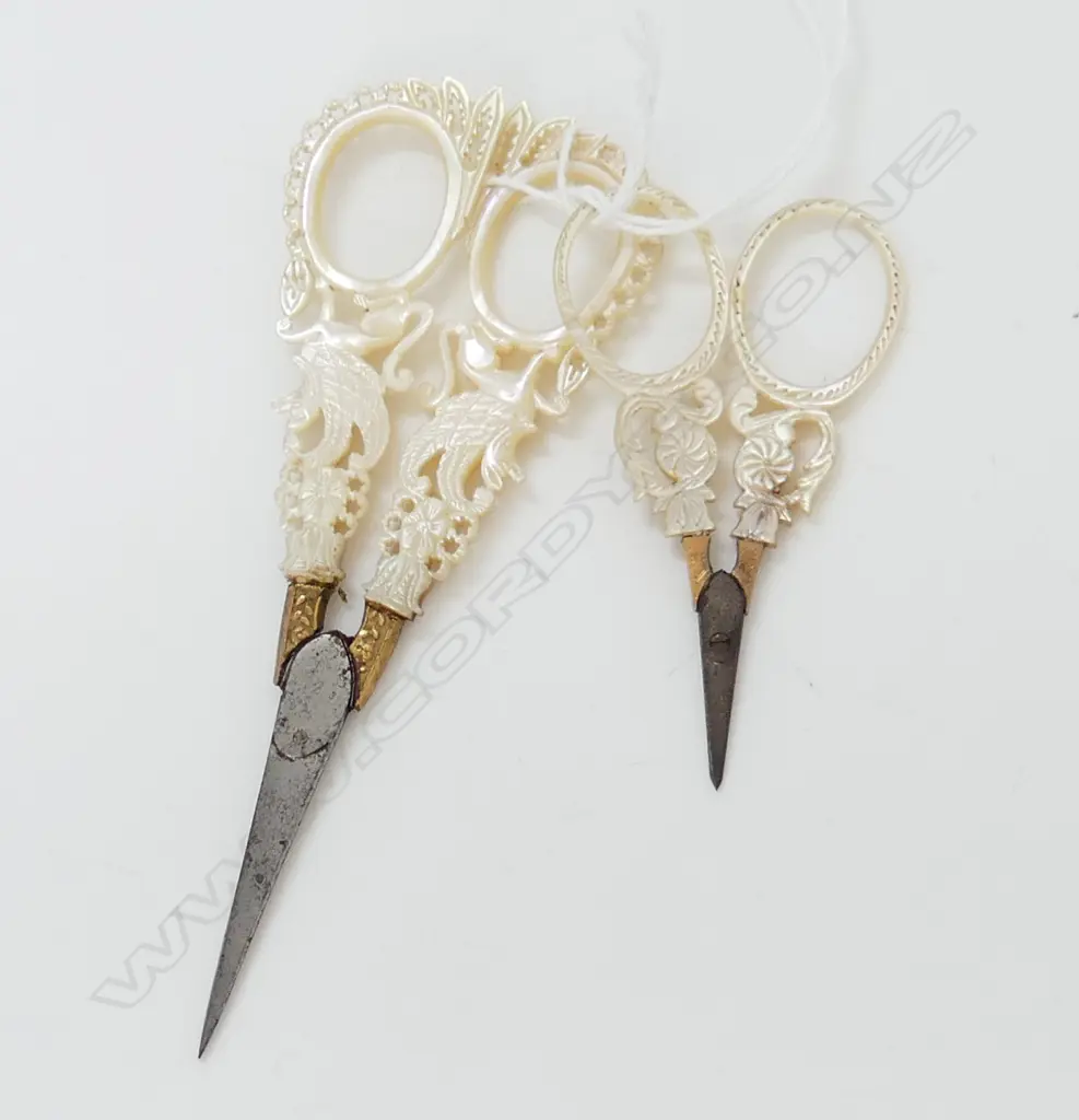 2 x PRs OF 19thC FANCY CARVED MOP & STEEL SISSORS: griffins to the handles + smaller pr Image 1++