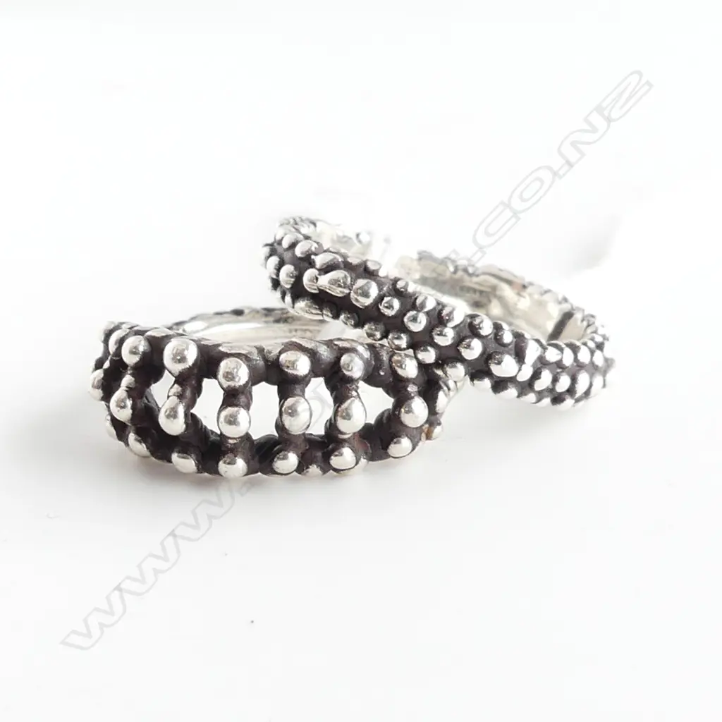 TWO DESIGNER SILVER RINGS SIZE K Image 1++