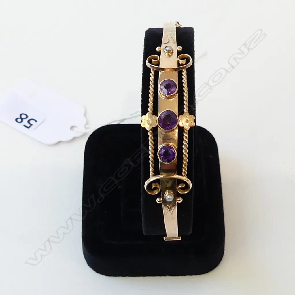 9ct AMETHYST SET BANGLE HALLMARKED 'CHESTER', 6.1gm (faults) Image 1++