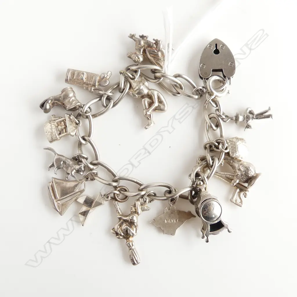 SILVER CHARM BRACELET 14 CHARMS 40gms Image 1++
