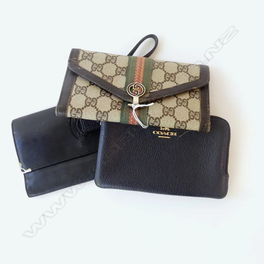 3 DESIGNER WALLETS; GUCCI (WORN) COACH, CARTIER Image 1++