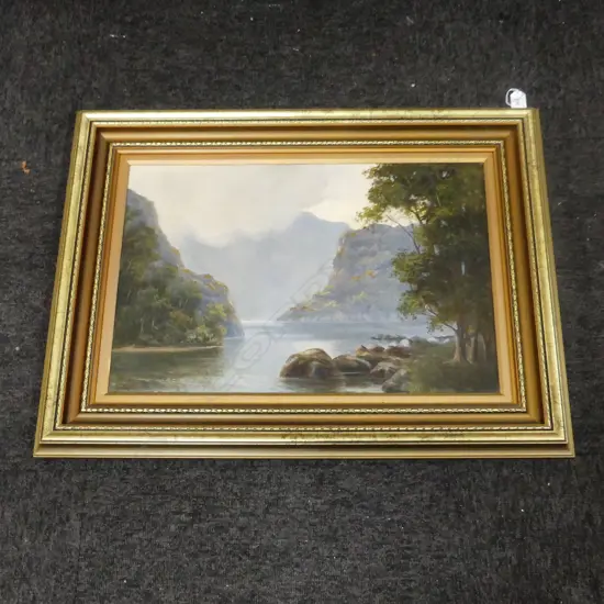 COLONIAL OIL ON BOARD SIGNED VERSO - E. R. RAYNOR? 'TOWARDS THE ARTHUR RIVER, MILFORD SOUND' 370x560mm