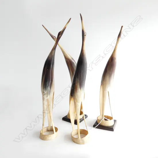 FOUR CARVED HORNS AS STANDING CRANES ALL APPROX H.400mm