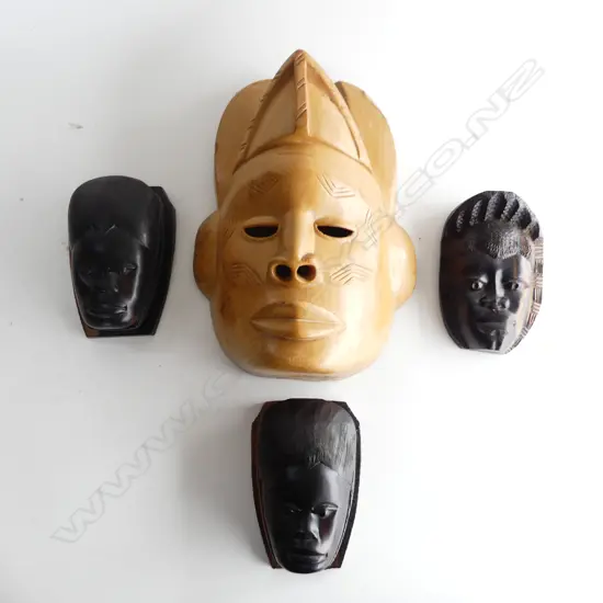 FOUR AFRICAN WALL MASKS. THREE ZEBRAWOOD H.170mm & ONE PALE TIMBER H. 340mm