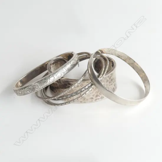 6 SILVER BANGLES & ONE WIDE CUFF w hand beaten effect 89gms