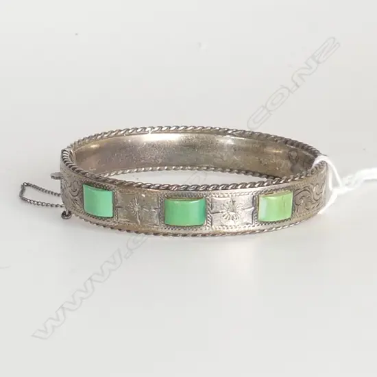 SILVER ENGRAVED HINGED BANGLE inlaid with 3 green stone panels