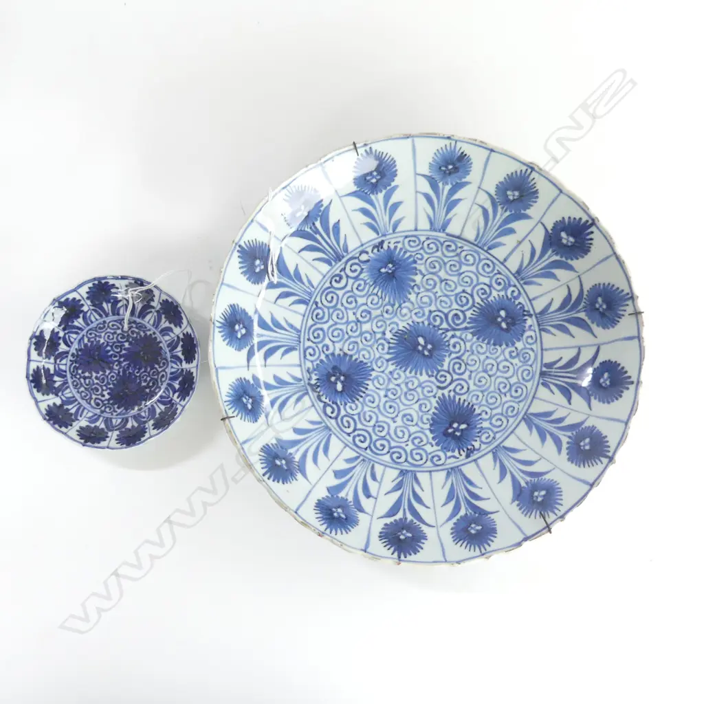 2 ANTIQUE CHINESE B/WHITE DISHES SUN FLOWER PAT DIA 280MM some small glaze fritting. small chips to foot Image 1++